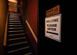 As you enter the main door, go up the set of stairs to our reception area.