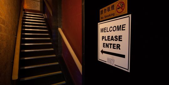 As you enter the main door, go up the set of stairs to our reception area.