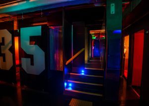 Level 3 suckatorium is very popular during our theme parties. Climb up the stairs to access the 4 glory holes or walk through the metal curtain to see who is waiting for you.