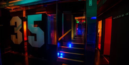 Level 3 suckatorium is very popular during our theme parties. Climb up the stairs to access the 4 glory holes or walk through the metal curtain to see who is waiting for you.