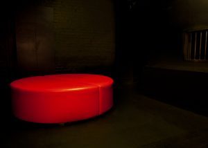 Sexy circular bed in the dark room.